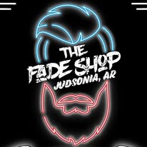 The Fade Shop, Judsonia, AR — shop logo: neon-style hair outline in blue, beard outline in red, on black